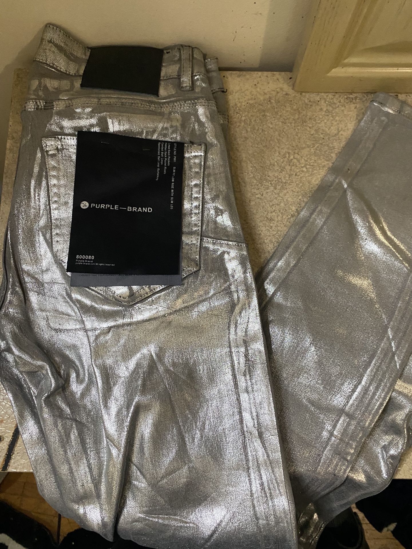 purple jeans ( black tag)