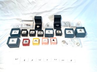 Mostly brand new some like new  gold and .925 silver rings with different gemstones. Different sizes.