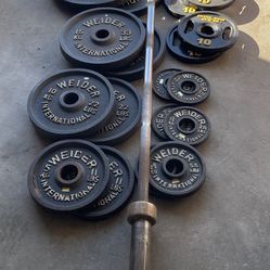 302lbs Olympic weights+barbell