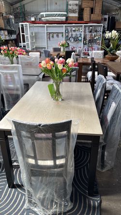 Very nice table with 5 seats.