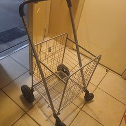 Grocery cart folding
