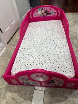 Minnie Mouse toddler bed and airplane
