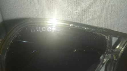 Grey framed Gucci glasses
