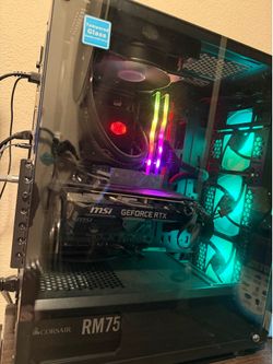 Gaming PC with monitor, keyboard and mouse, and speakers
