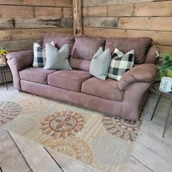 Brown cloth sofa