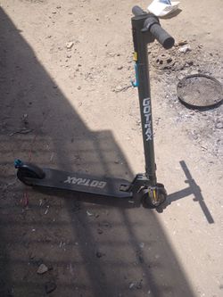 BRAND New GO-TRECX SCOOTER /WITH THE CHARGER TO GO WITH IT