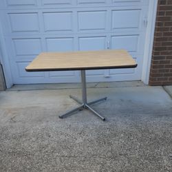Table kitchen heavy duty. Solid. Metal Legs.  48in x 30in.