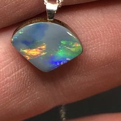 Australian Opal Doublet Gemstone Coober Pedy Bright Multicolored Freeform shaped gem with ironstone back. 4.1ct 14x10x4mm