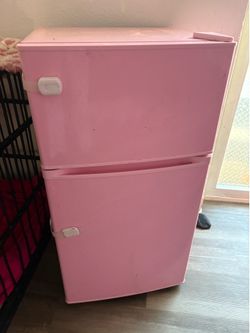 Pink mini fridge