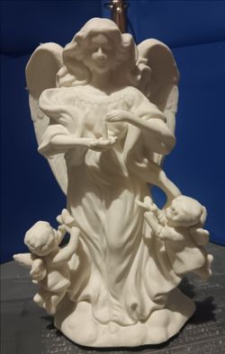 Angel candle stick holder