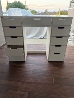 Vanity with lighted mirror