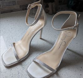 Jessica Simpson Osrey sandal features delicate rhinestone embellished.