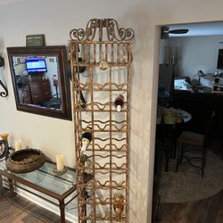7’ wrought iron rustic wine rack Beautiful very heavy & sturdy bolts to the wall holds 30 Bottles 