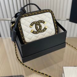 Chanel Lambskin Quilted Small CC Filigree Vanity Case Black and White