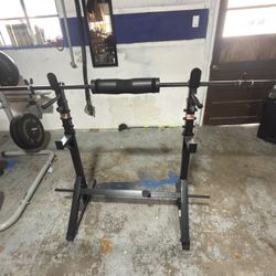 Squat rack w/ 68” bar & Dip And Pull-Up Bar