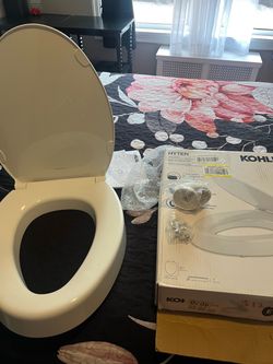 New toilet seat elevated elongated