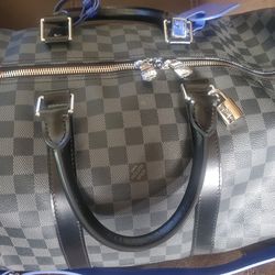 Leagher Duffle Bag