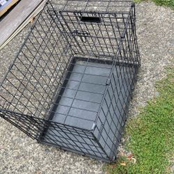 Dog Crate Length 24, Width 17  , Height 19.price 15$.   Pick Up.  E. 67th. and Grandview. E.  Tacoma 