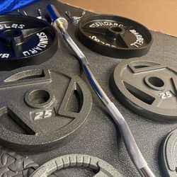 NEW Olympic Equipment Curl Bar of 20# with Cooper Bearings and Plates 2X35s, 2X25s, 2X10s and 2X5s pounds. Brute 170#