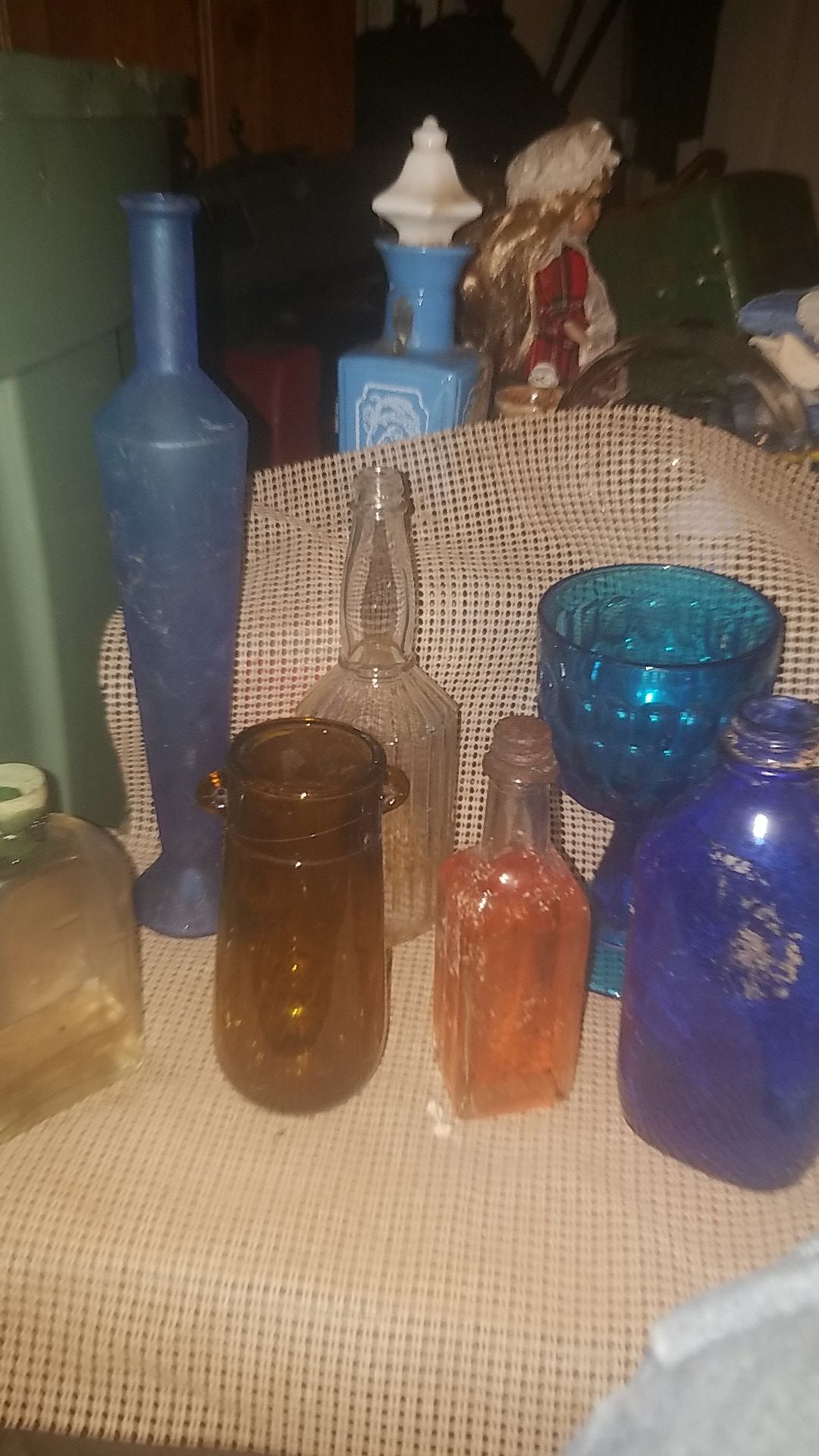 Antique bottles and medicine bottles and vases