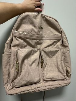 Used Rose Gold Kipling Backpack $20