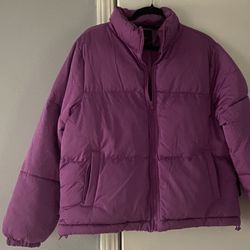  Oversized purple puffer jacket with front pockets  zip up size medium