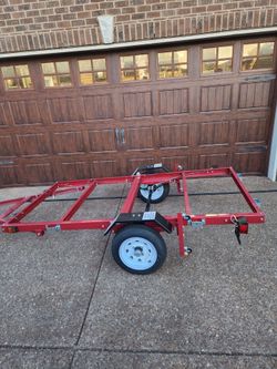 *** BRAND NEW- 4 FT BY 8 FT UTILITY TRAILER ***