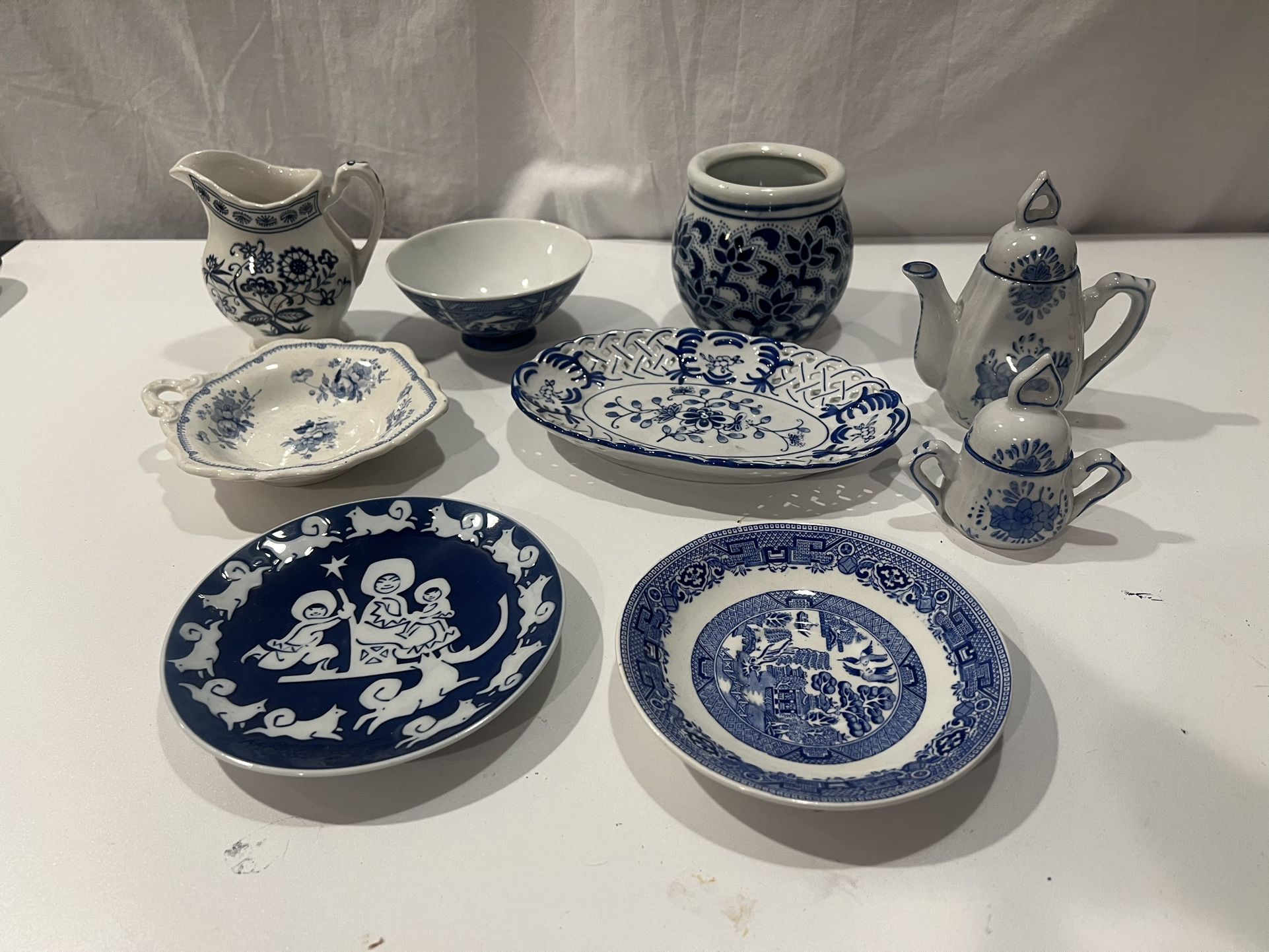 Lot of blue & white ceramic dishes bowls tea pots & pots