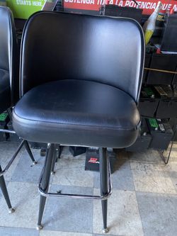 Two bar stools swivel