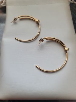 Cartier earrings and Ring $1500 Pickup In Oakdale