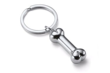 Philippe Dog Bone pendant keychain. Unopened in box