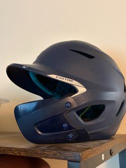 Batting helmet with jaw guard