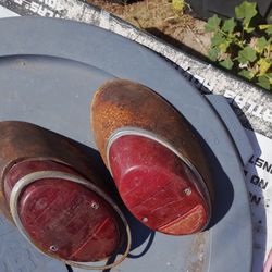 Vintage original vw rear lights, lenses, chrome trim and,bulb holder, and wiring harness if wanted depends on the piece you want