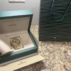 Rolex - Gold & White Oyster