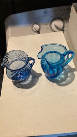 Two Depression glass small pitchers