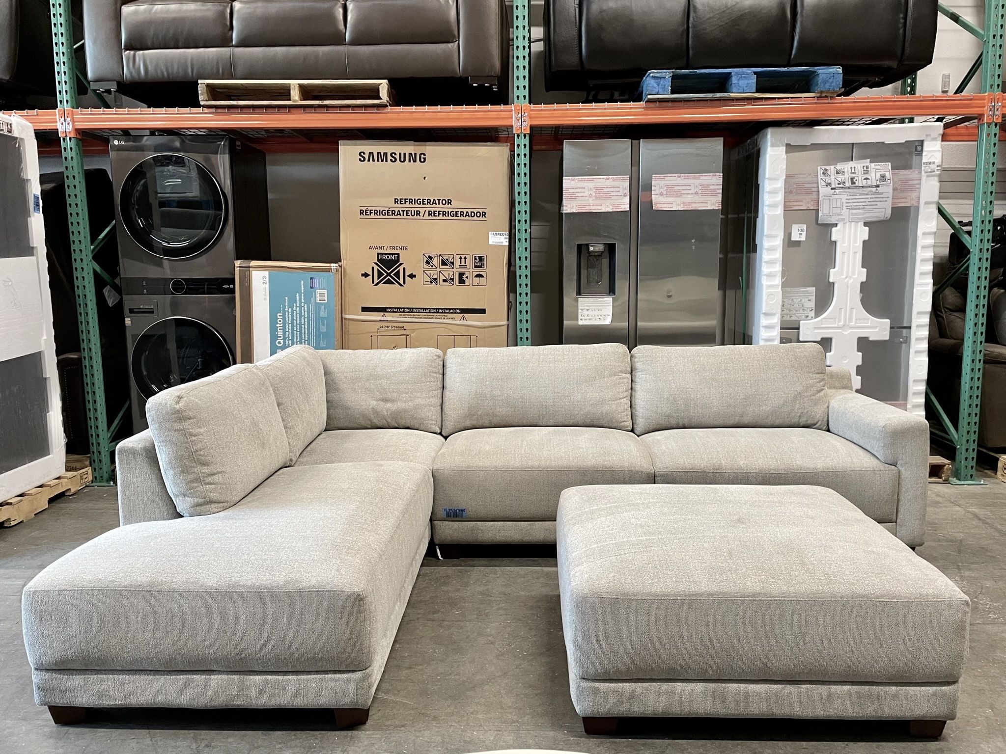 Raylin Fabric Sectional With Ottoman