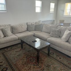 Couch Furniture With A Coffee Table And Two Side Tables