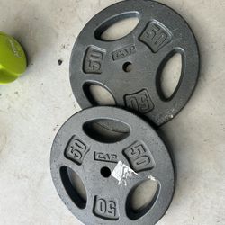 pair of 50lb 1 inch iron plates $80