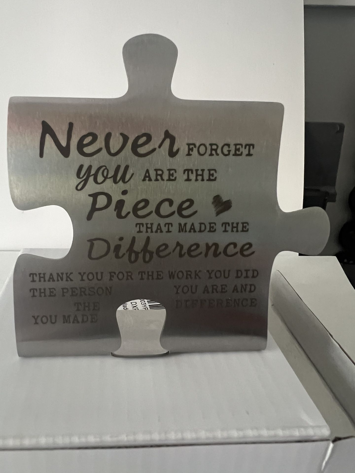 puzzle piece-shaped appreciation gift or keepsake.