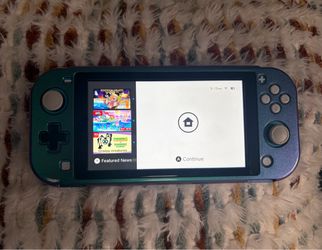 Nintendo Switch Lite Turquoise + Hard Shell & Carrying Case