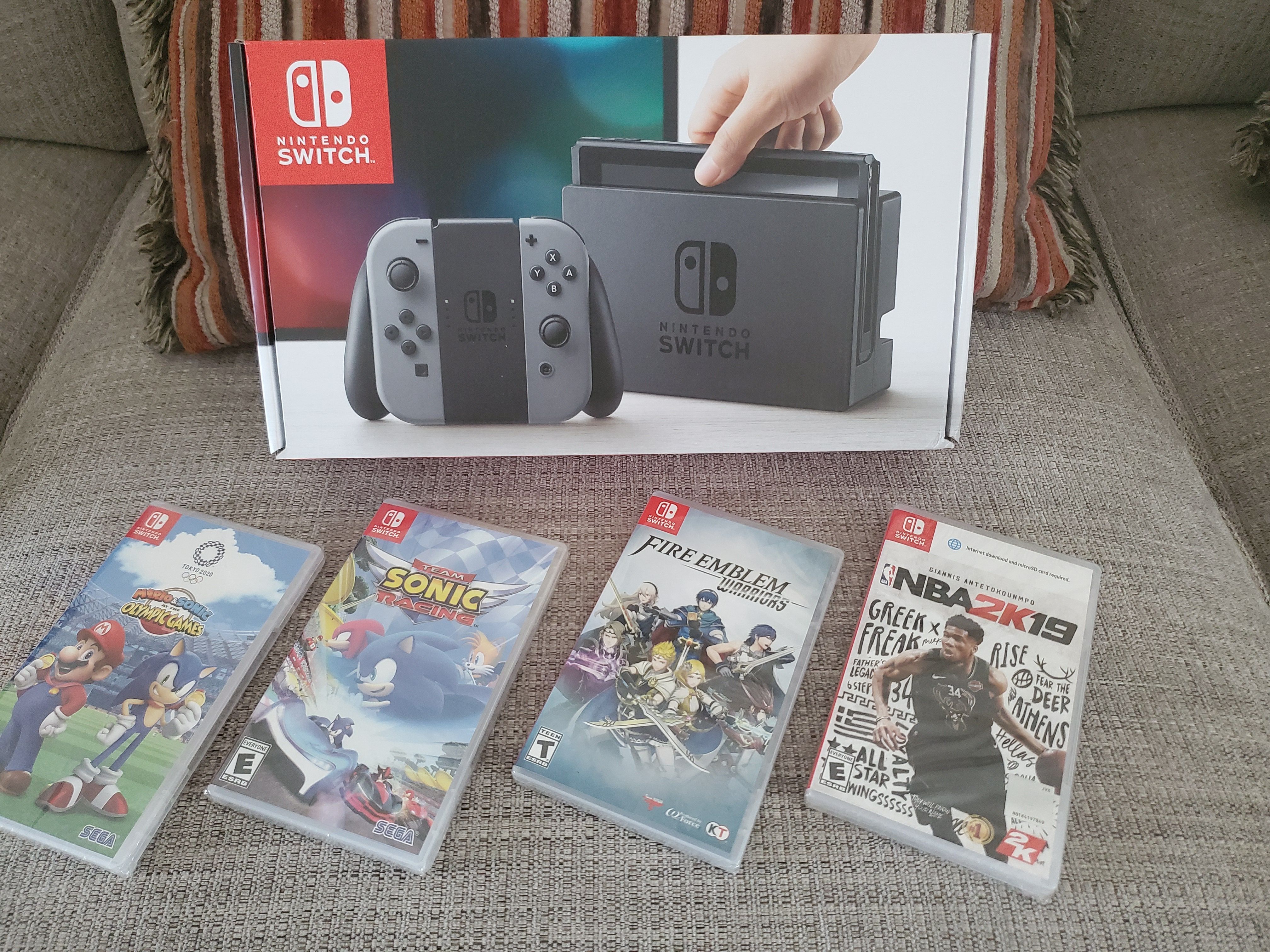 NINTENDO SWITCH + 4 PREMIUM GAMES (NEW) NO TRADES