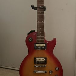 Epiphone Les Paul Cherry Sunburst And Combo Amp