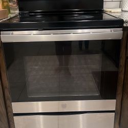 GE 30-in Glass Top 4 burners 5.3-cu ft Freestanding Electric Range (Stainless steel)