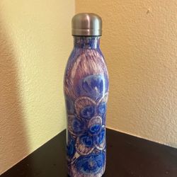 Insulated stainless steel water bottle with peacock design.