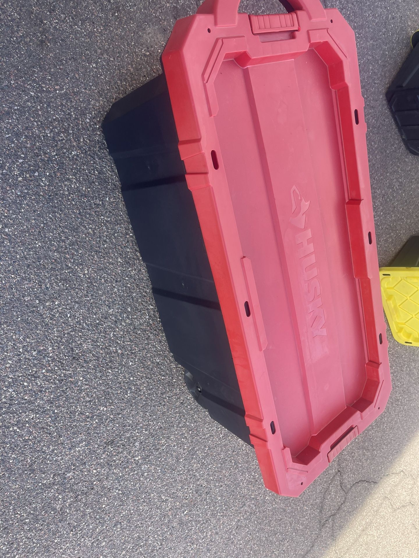 2 Husky 45 Gallon Totes On Wheels