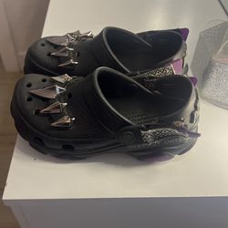 black panther crocs size 1