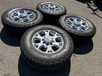 18” Stock dodge ram Cummins 2500 wheels and tires oem 8 lug