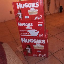 3 Boxes Of Huggies Diapers