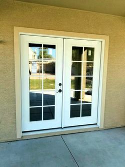 Brand new patio double french doors 10-lite with external grills