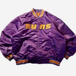  The product is a vintage Starter Phoenix Suns jacket from the 90s, officially licensed by the National Basketball Association (NBA). This purple jack